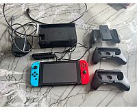 Nintendo Switch + 1 Spiel MarioKart 8 Deluxe +Tasche + 2 Grips