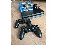 PlayStation 4 mit 2 Controllern und 6 Spielen